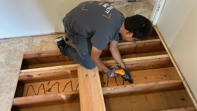 Subfloor joist reconstruction and reinforcement during a structural repair